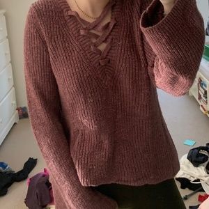 Knit sweater with tie neckline